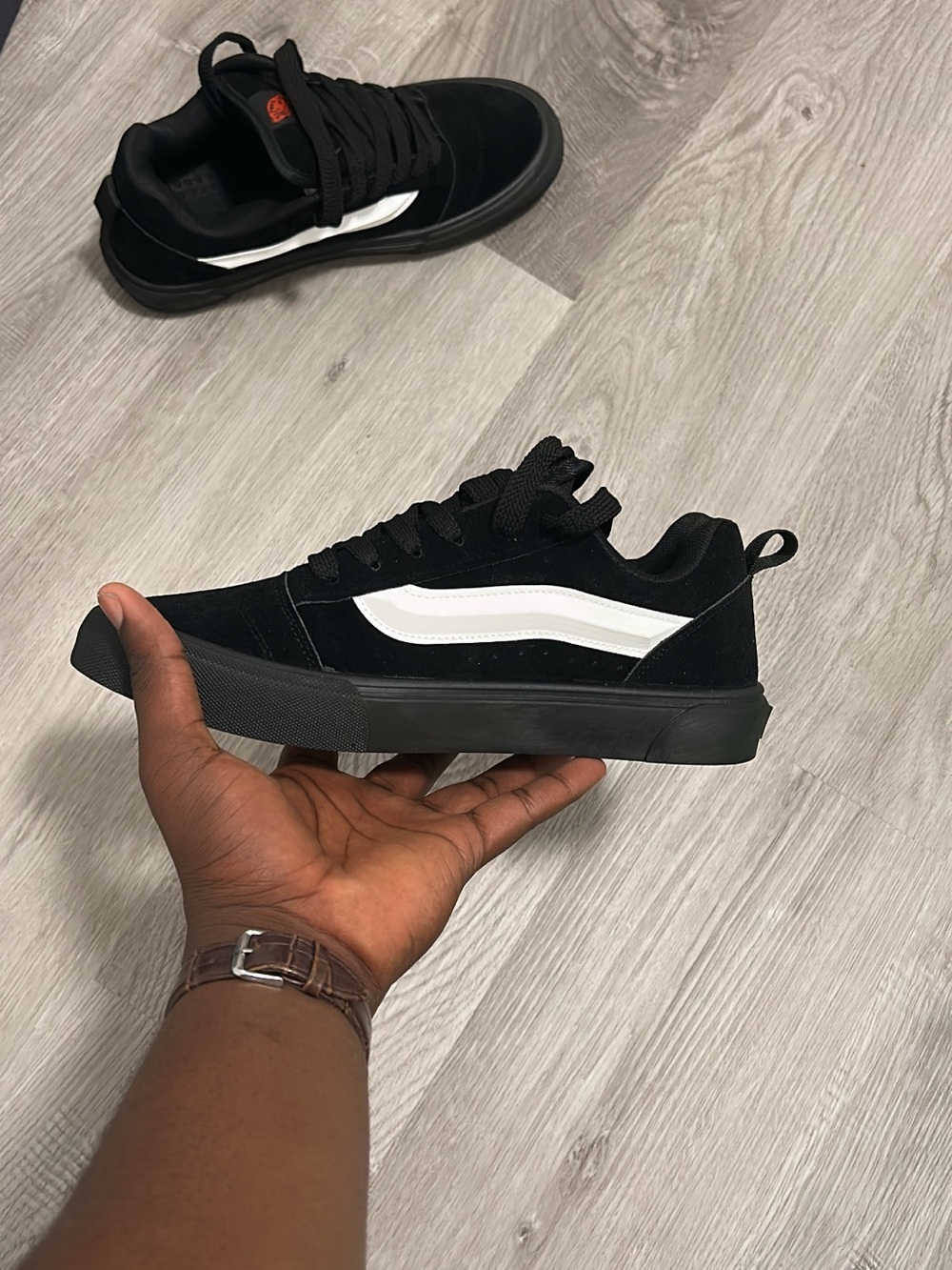 Men's Black Low-Top Sneakers with White Stripe
